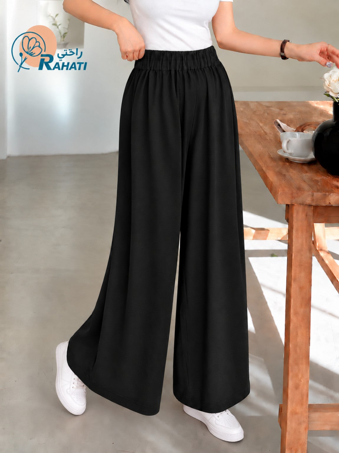 Women's black cotton wide-leg pants with elastic waistband